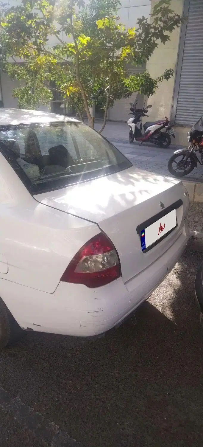 تیبا صندوق دار SX - 1399
