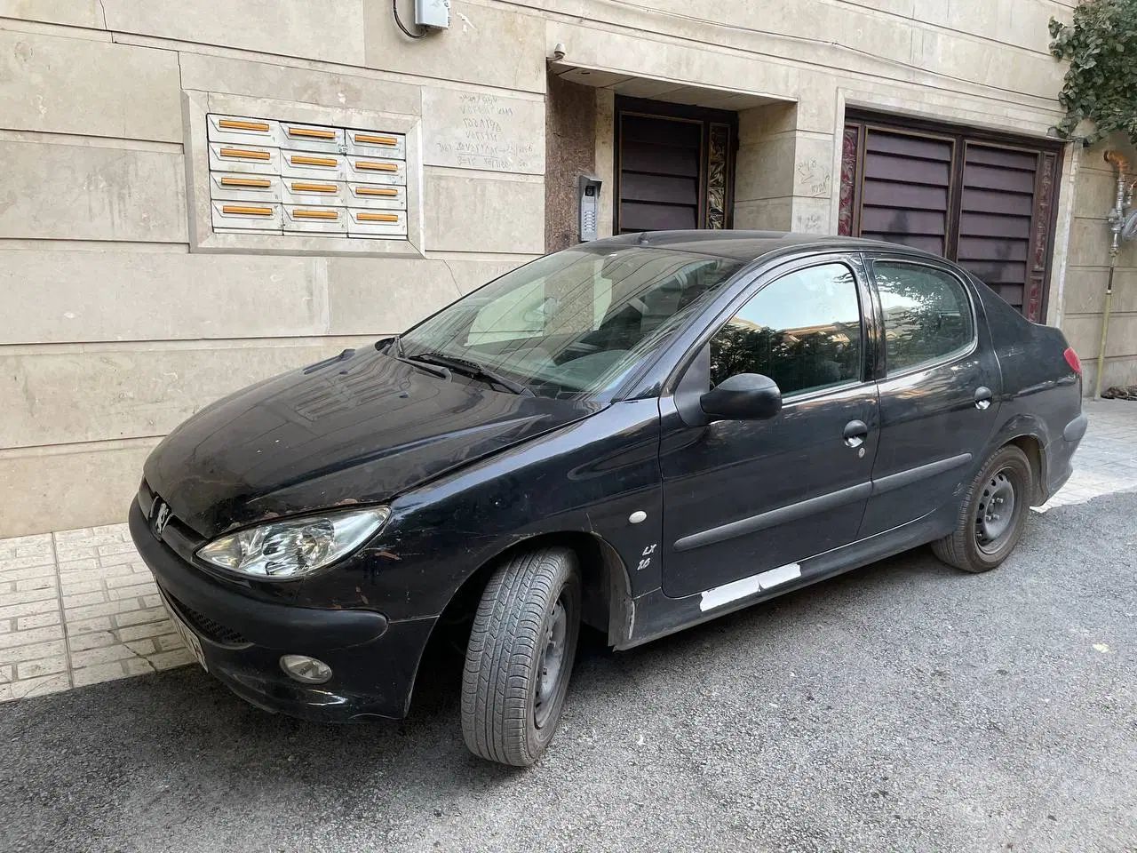 پژو ۲۰۶ صندوق دار v8 - 1396