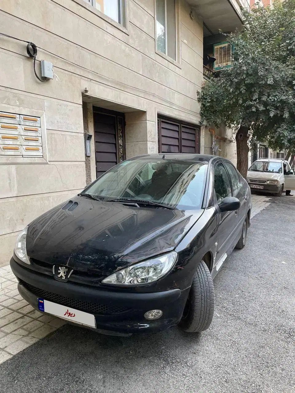 پژو ۲۰۶ صندوق دار v8 - 1396