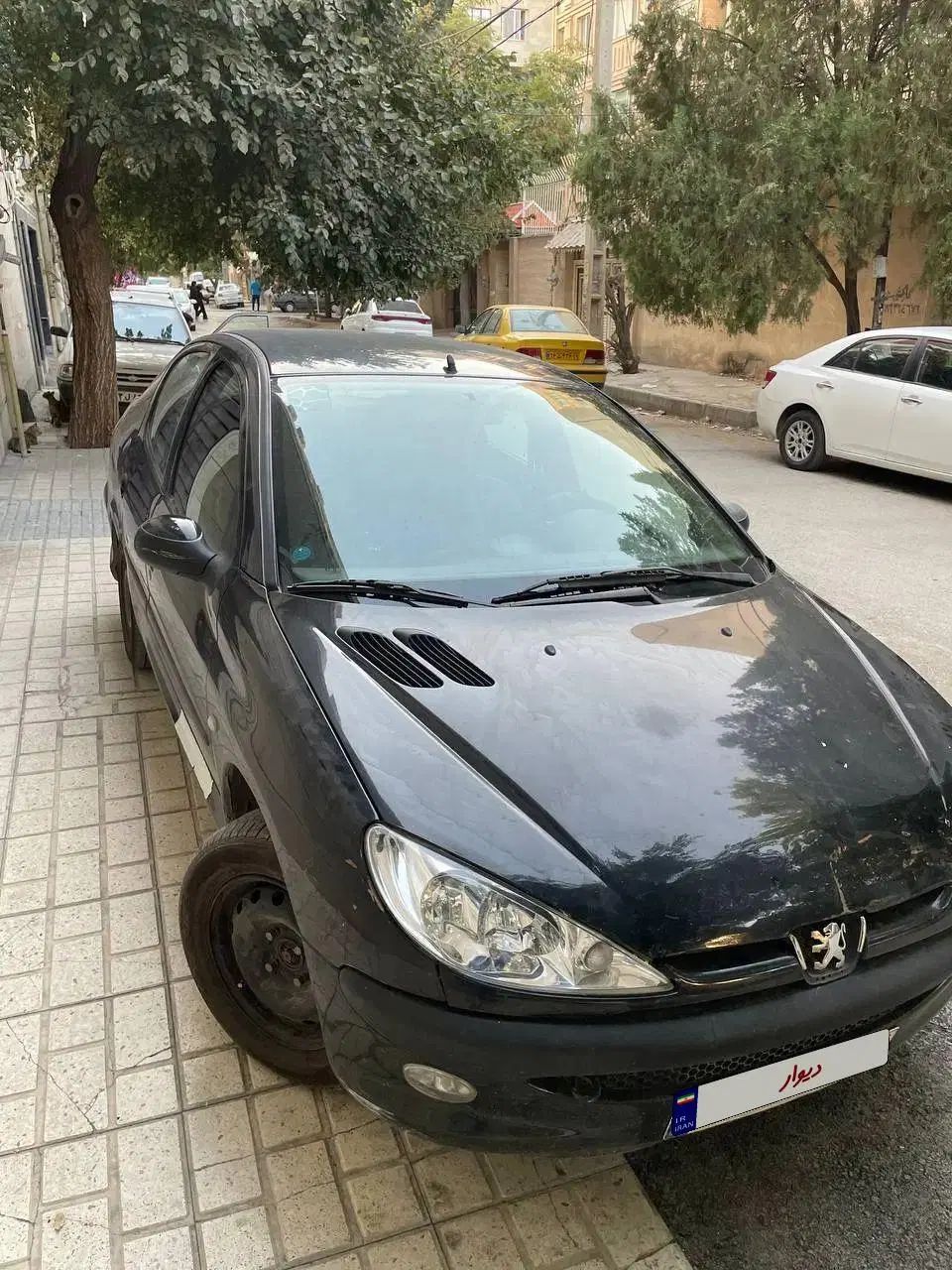 پژو ۲۰۶ صندوق دار v8 - 1396