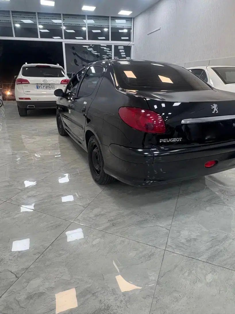 پژو ۲۰۶ صندوق دار v8 - 1394