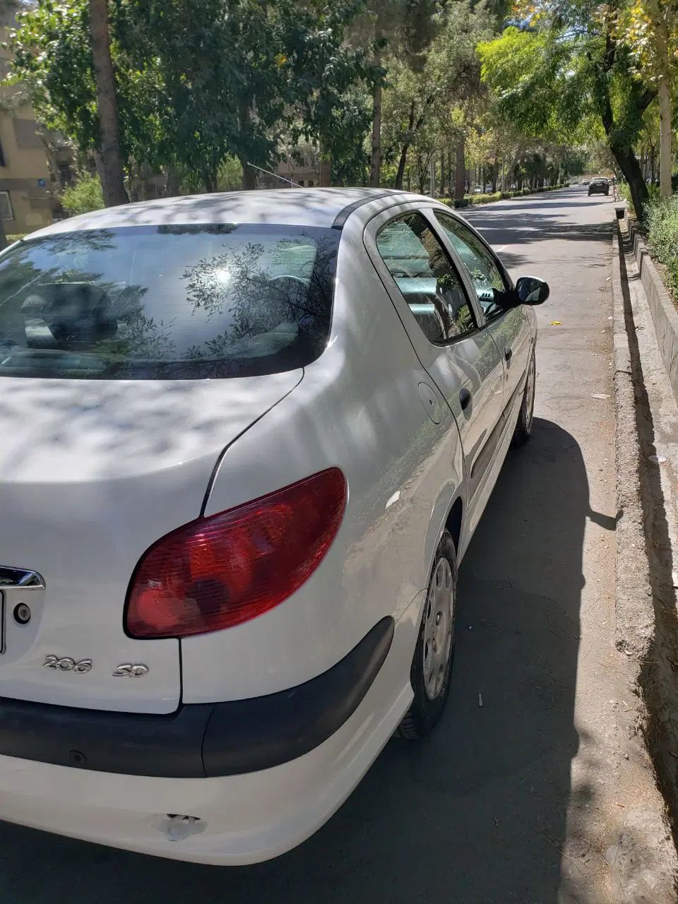 پژو ۲۰۶ صندوق دار v8 - 1397