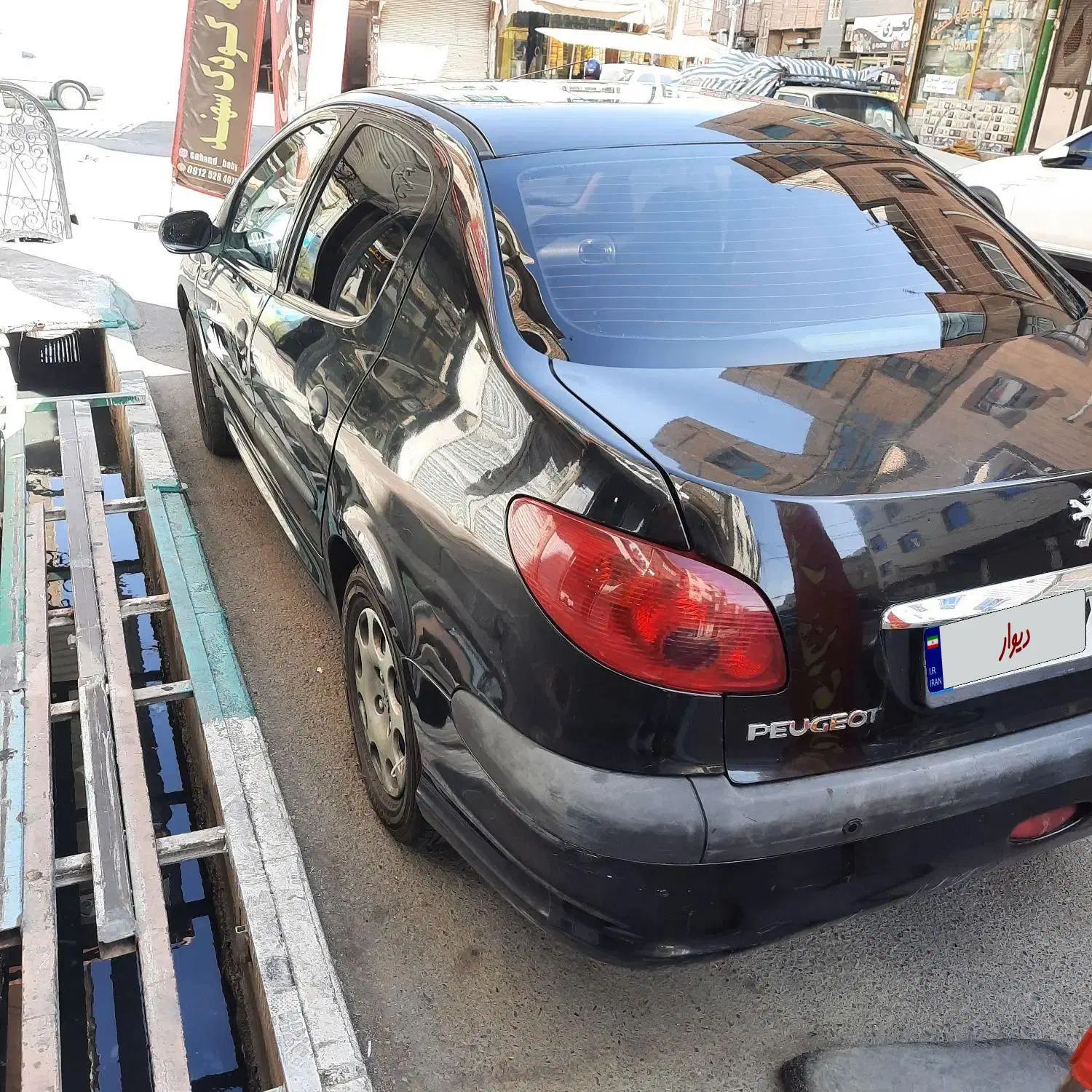 پژو ۲۰۶ صندوق دار v8 - 1393