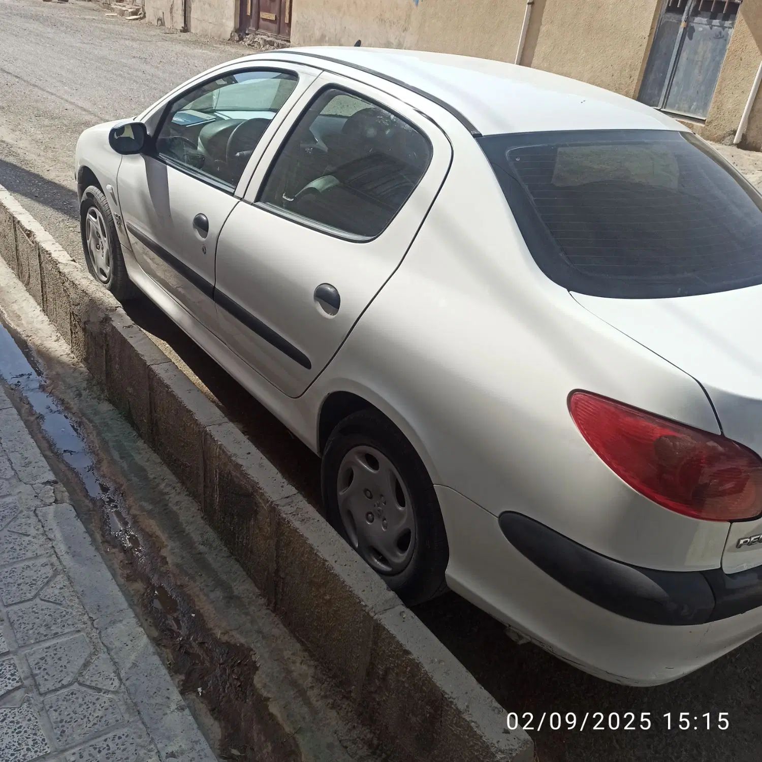 پژو ۲۰۶ صندوق دار v8 - 1395