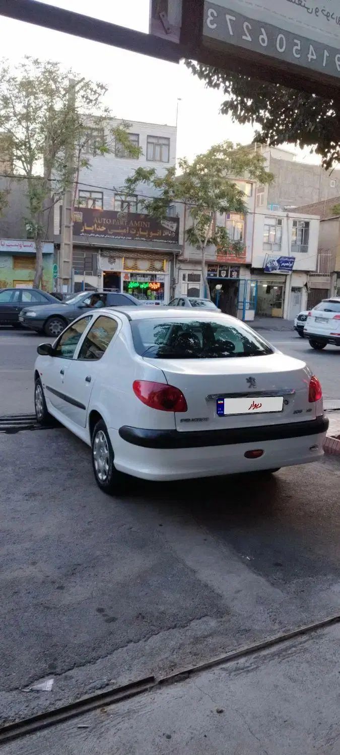پژو ۲۰۶ صندوق دار v8 - 1393