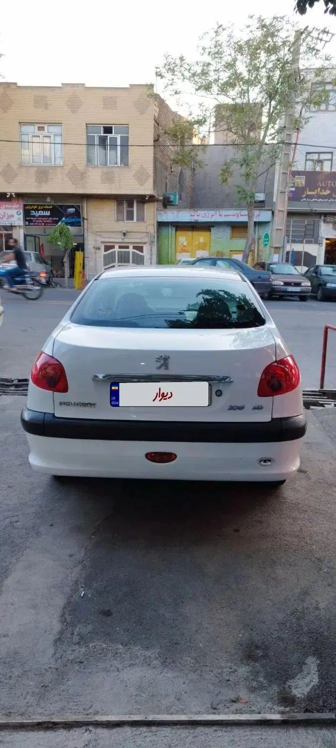 پژو ۲۰۶ صندوق دار v8 - 1393