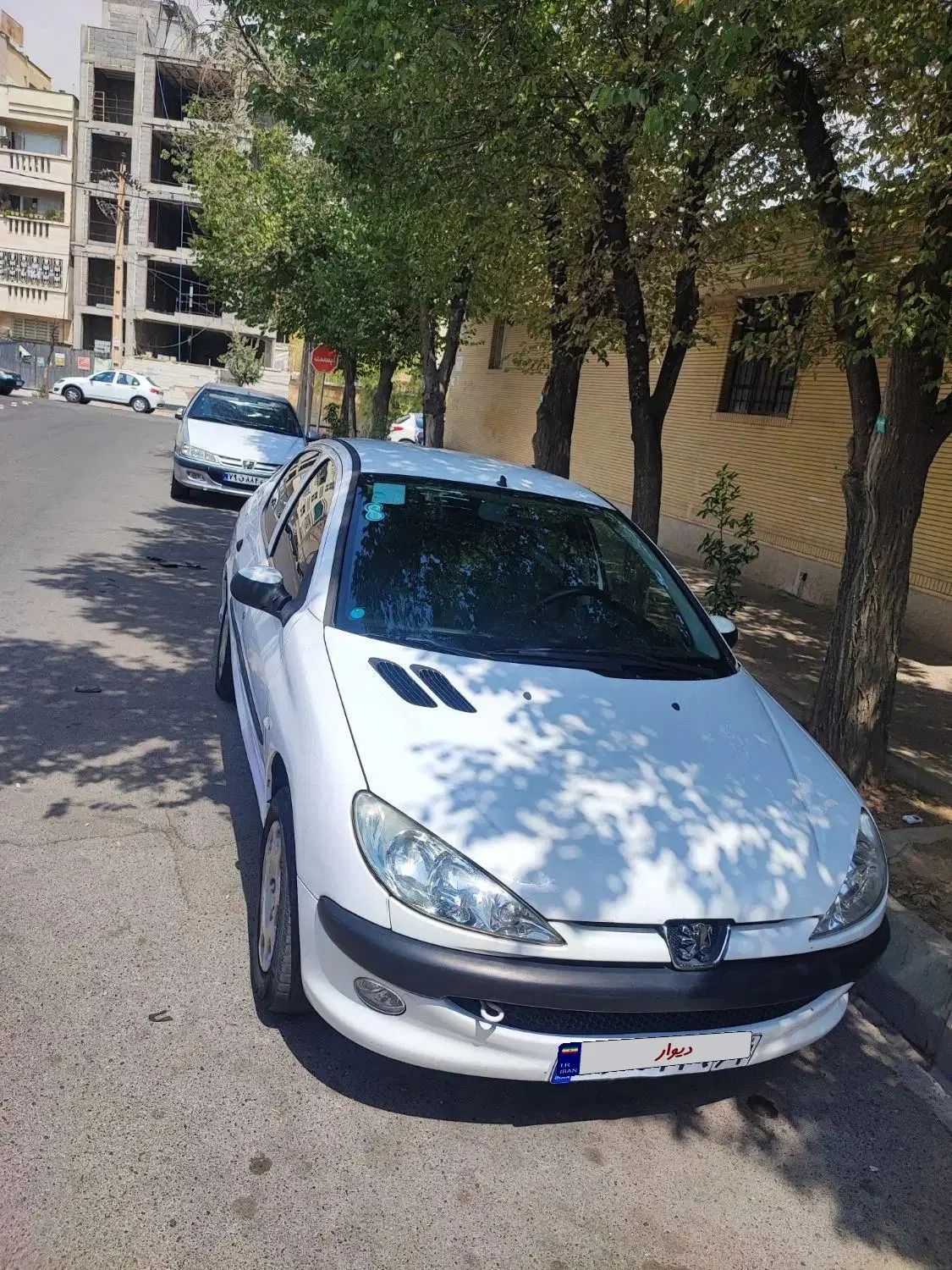 پژو ۲۰۶ صندوق دار v8 - 1395