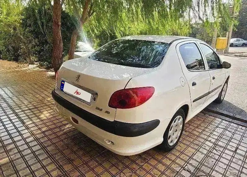 پژو ۲۰۶ صندوق دار v8 - 1396