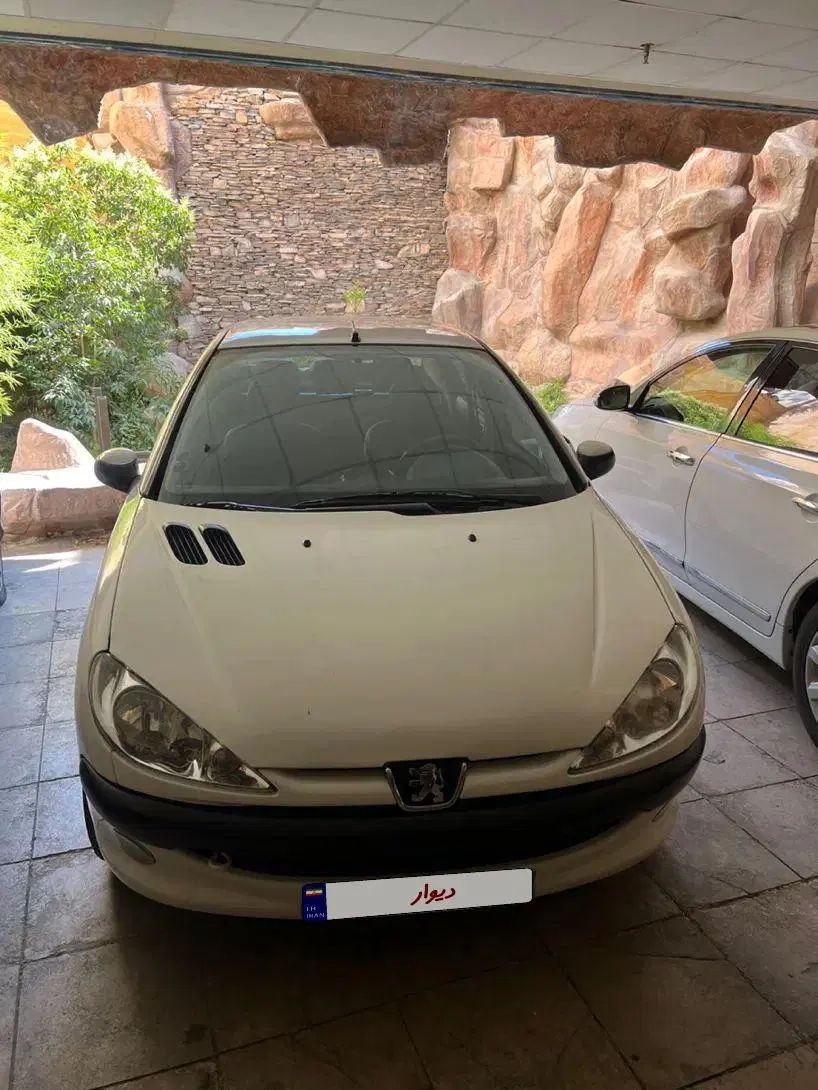 پژو ۲۰۶ صندوق دار v8 - 1391