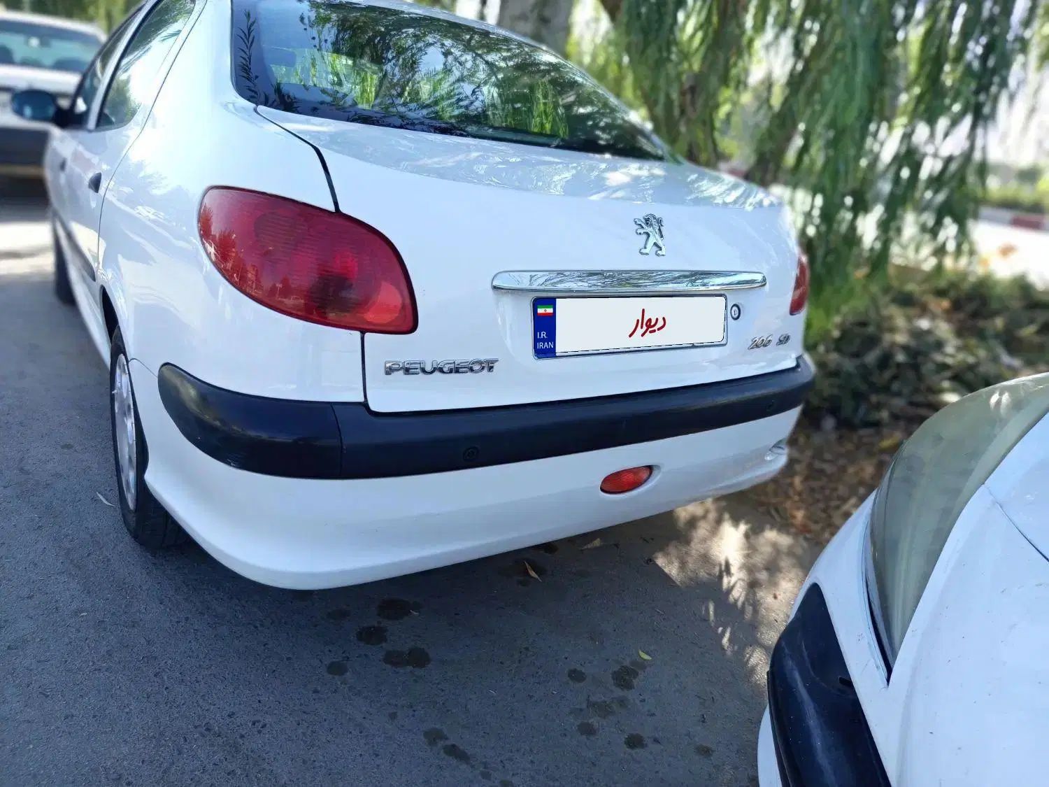 پژو ۲۰۶ صندوق دار v8 - 1396