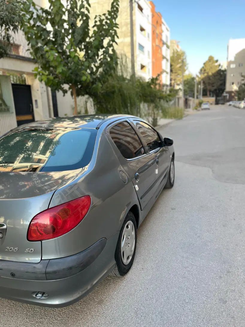 پژو ۲۰۶ صندوق دار v8 - 1394