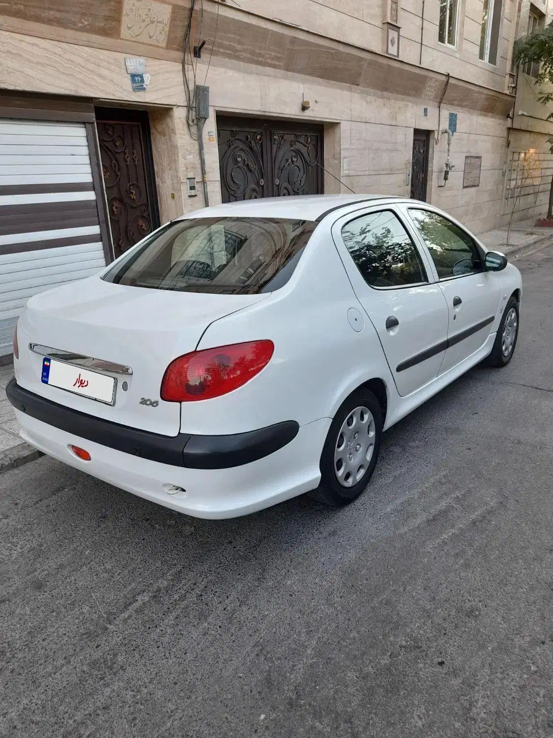 پژو ۲۰۶ صندوق دار v8 - 1395