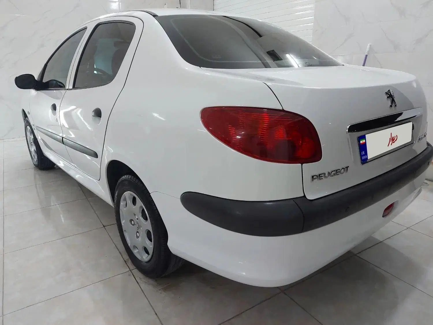 پژو ۲۰۶ صندوق دار v8 - 1399