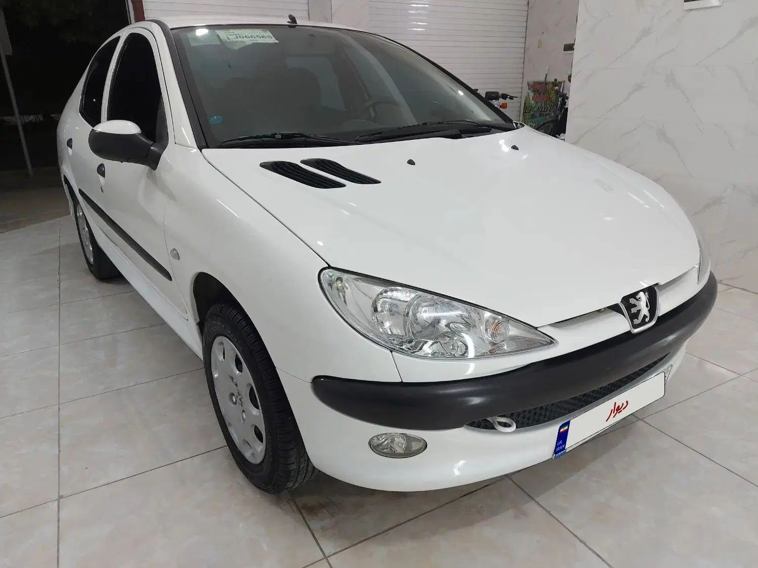 پژو ۲۰۶ صندوق دار v8 - 1399