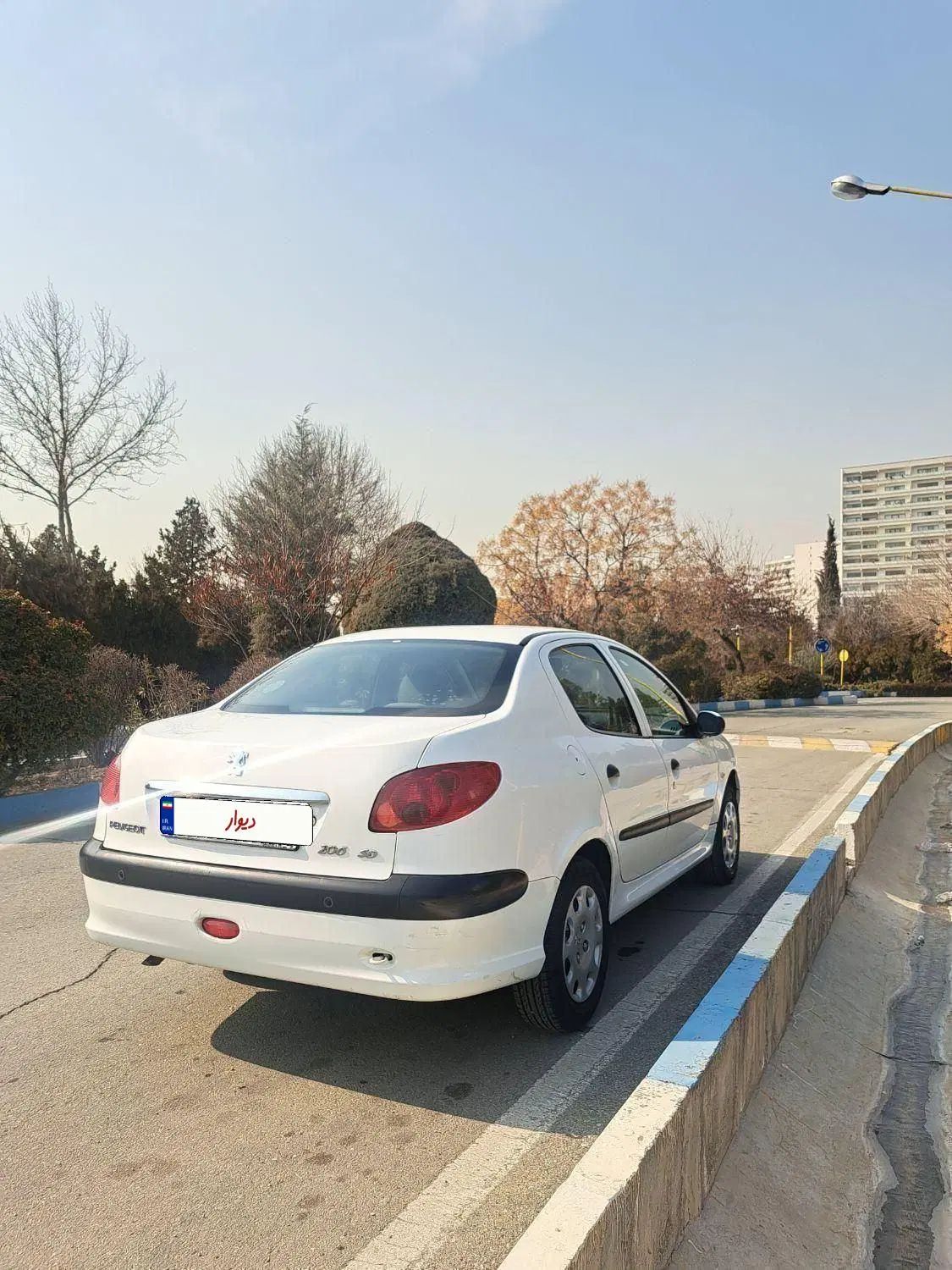 پژو ۲۰۶ صندوق دار v8 - 1396