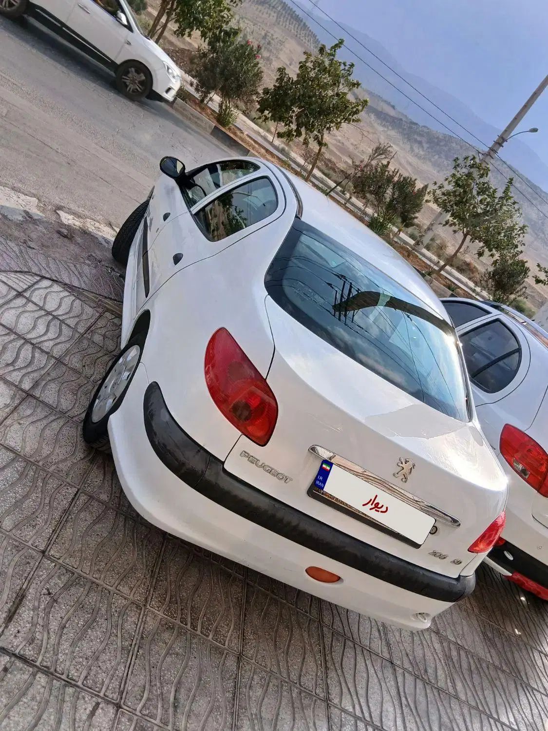 پژو ۲۰۶ صندوق دار v8 - 1394