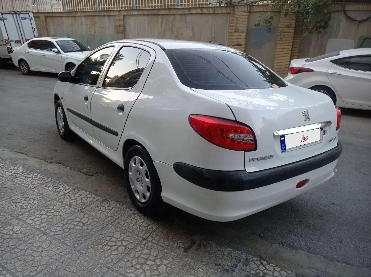 پژو ۲۰۶ صندوق دار v8 - 1396