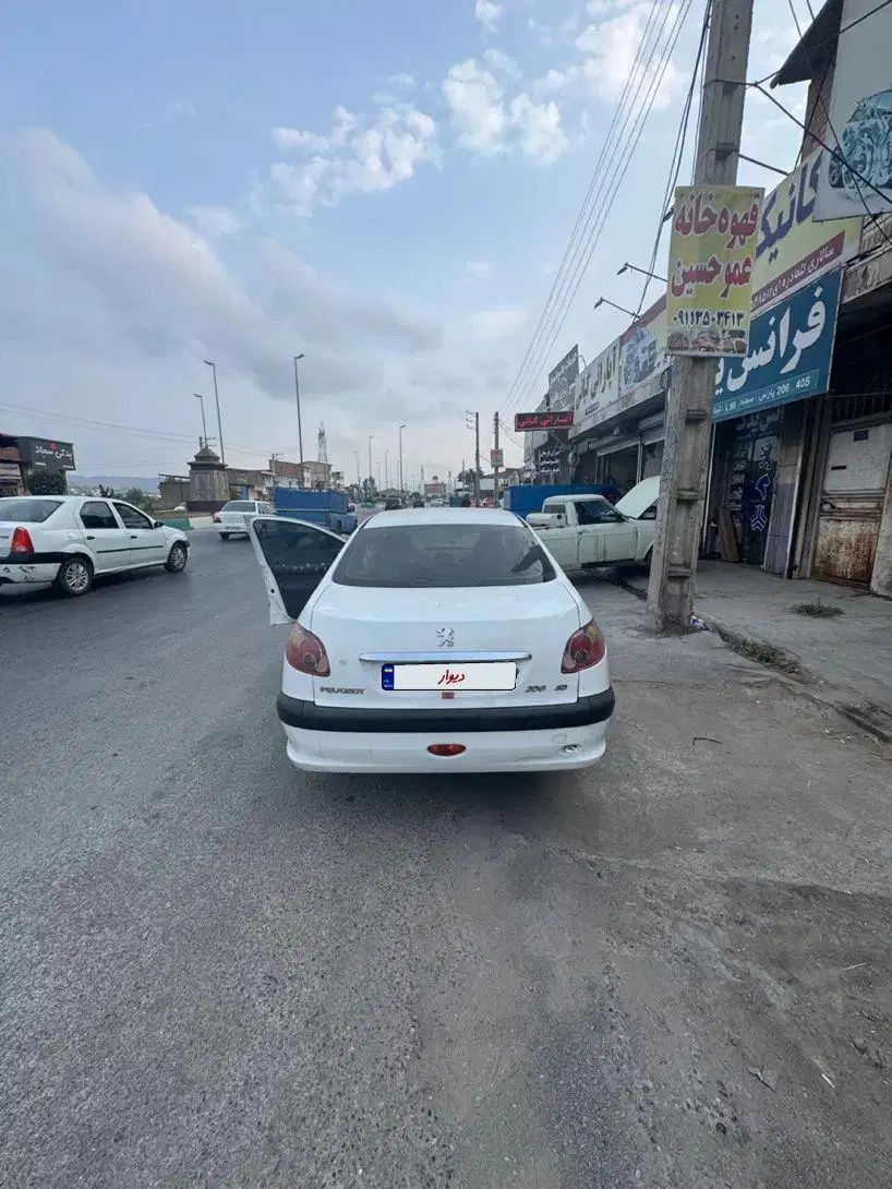 پژو ۲۰۶ صندوق دار v8 - 1393