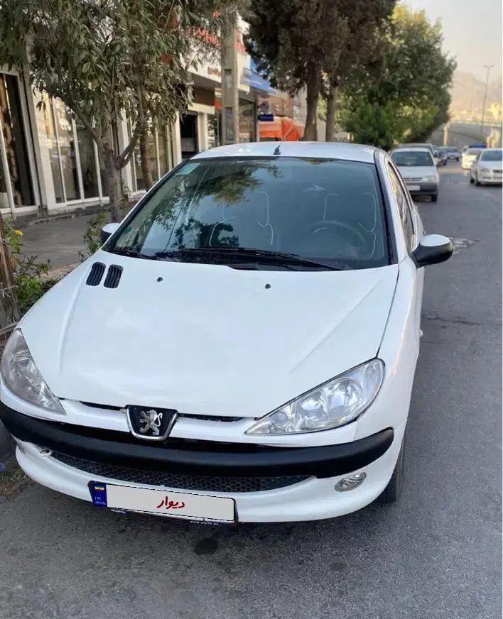 پژو ۲۰۶ صندوق دار v8 - 1396