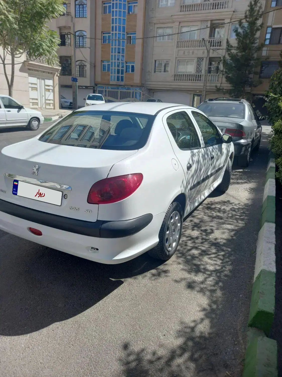 پژو ۲۰۶ صندوق دار v8 - 1399