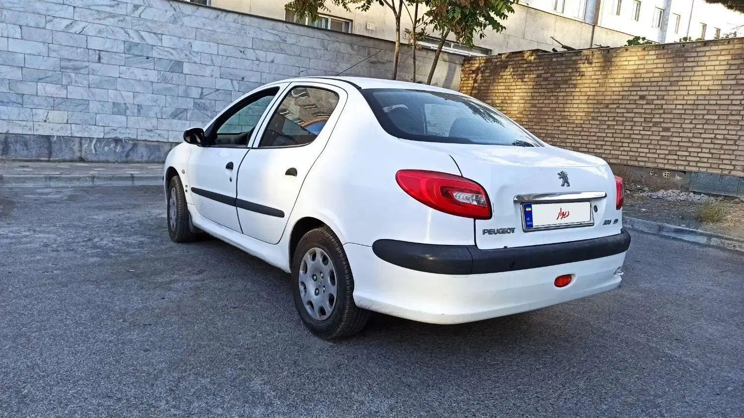 پژو ۲۰۶ صندوق دار v8 - 1396