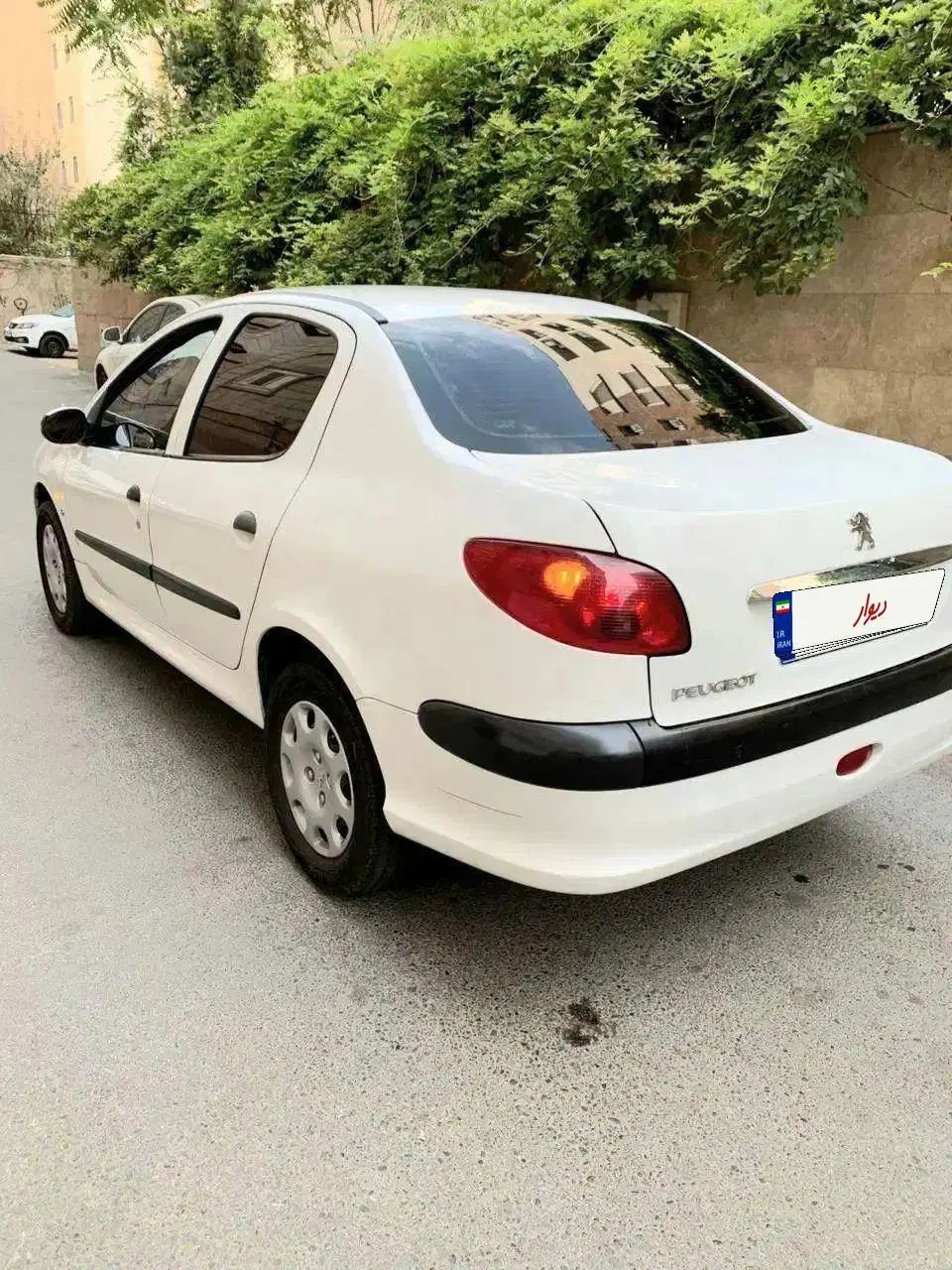 پژو ۲۰۶ صندوق دار v8 - 1399