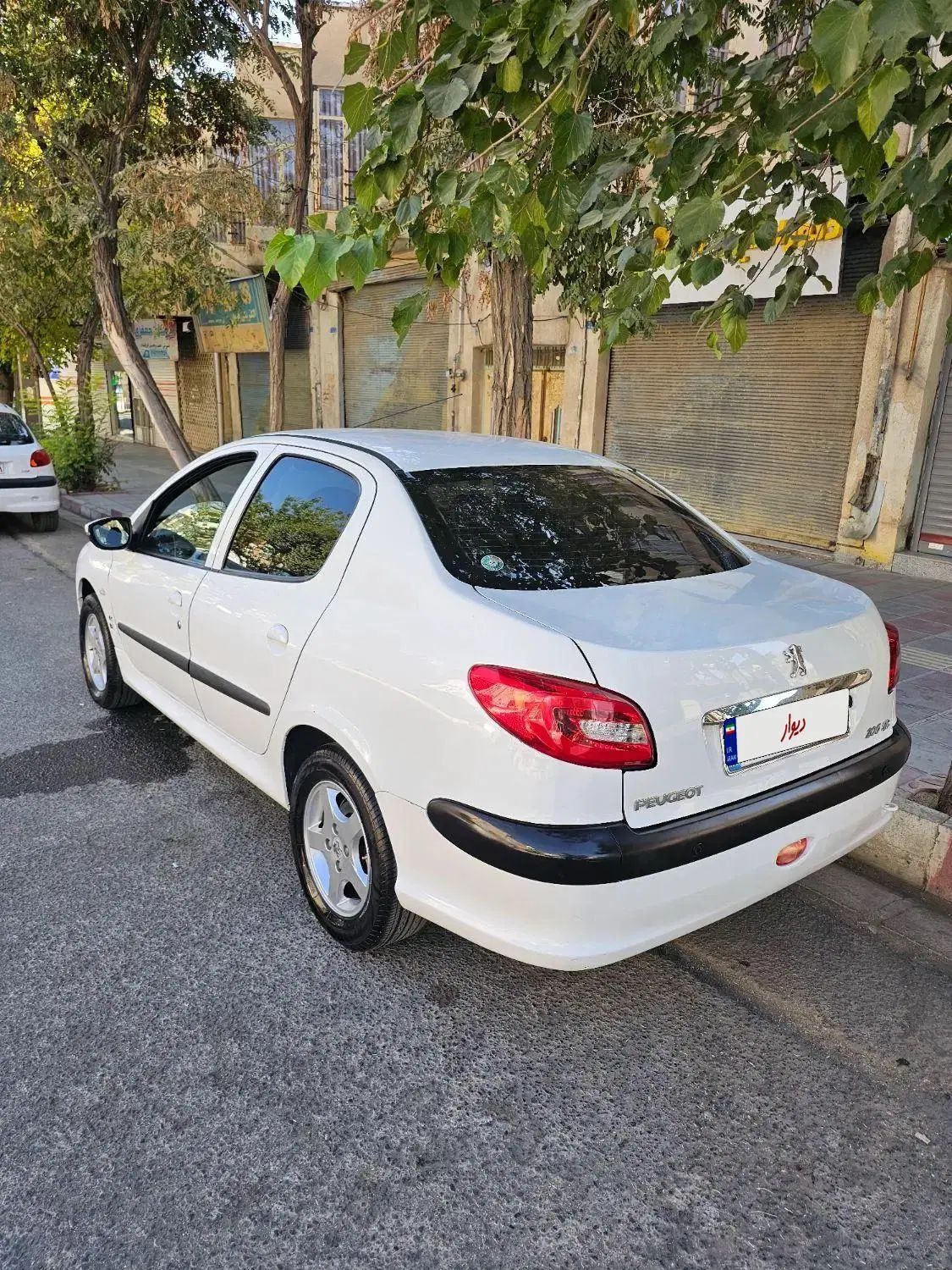 پژو ۲۰۶ صندوق دار v8 - 1395