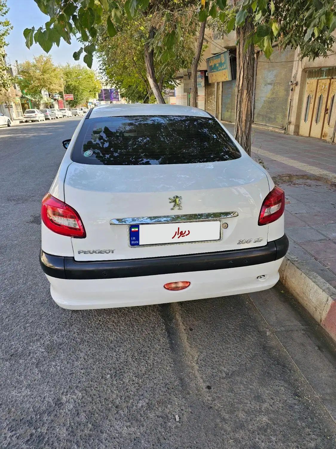 پژو ۲۰۶ صندوق دار v8 - 1395