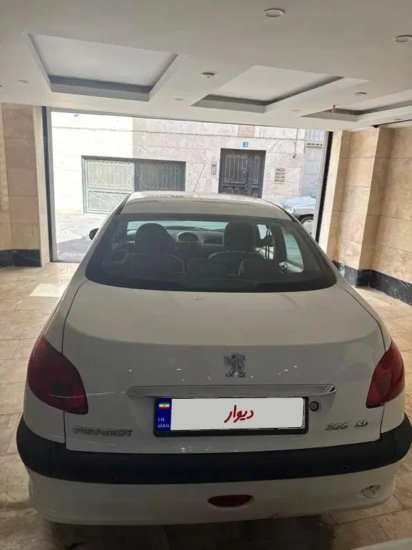 پژو ۲۰۶ صندوق دار v8 - 1396