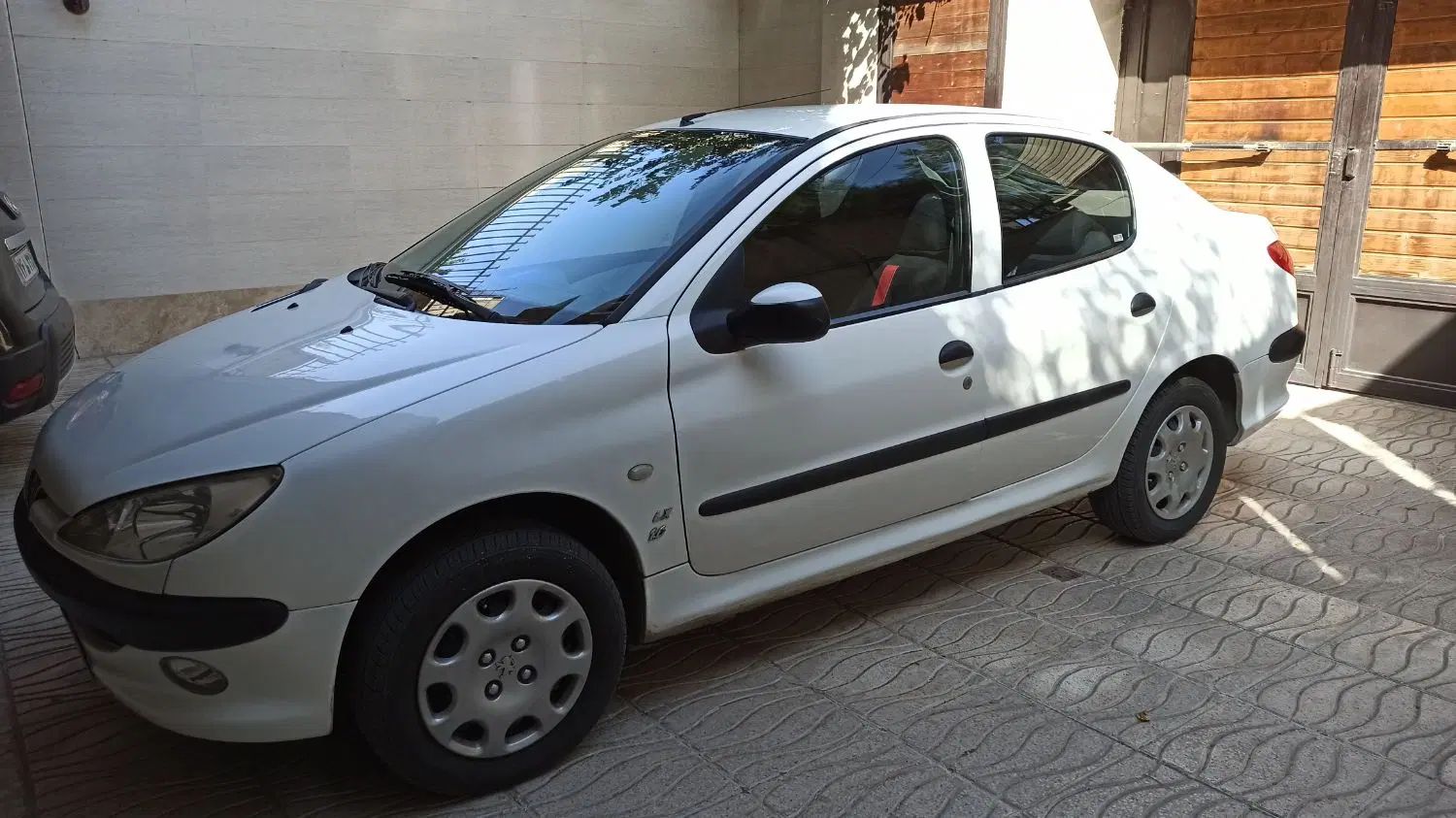 پژو ۲۰۶ صندوق دار v8 - 1394