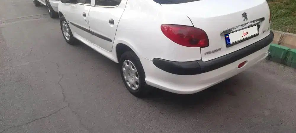 پژو ۲۰۶ صندوق دار v8 - 1396