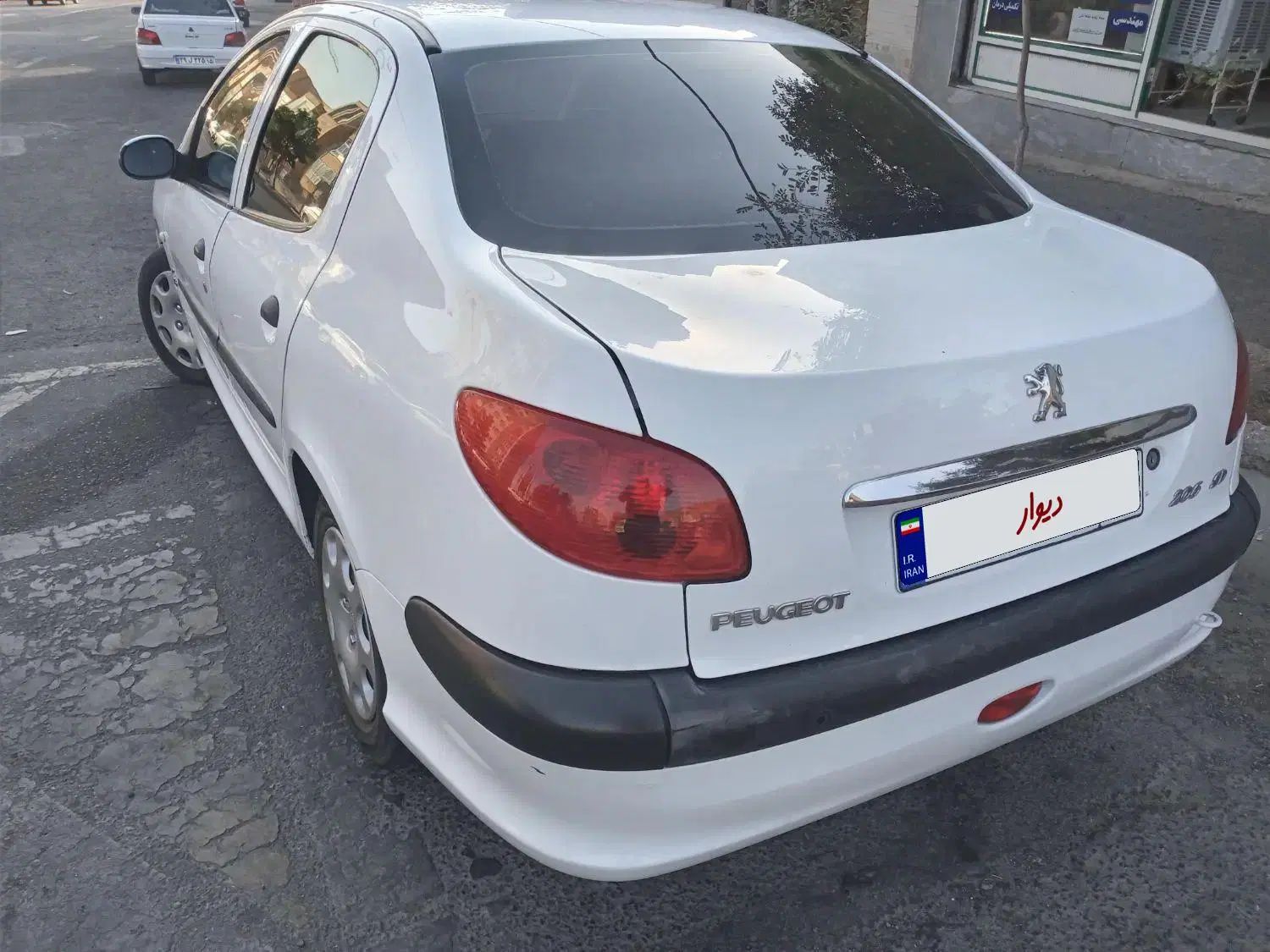 پژو ۲۰۶ صندوق دار v8 - 1395