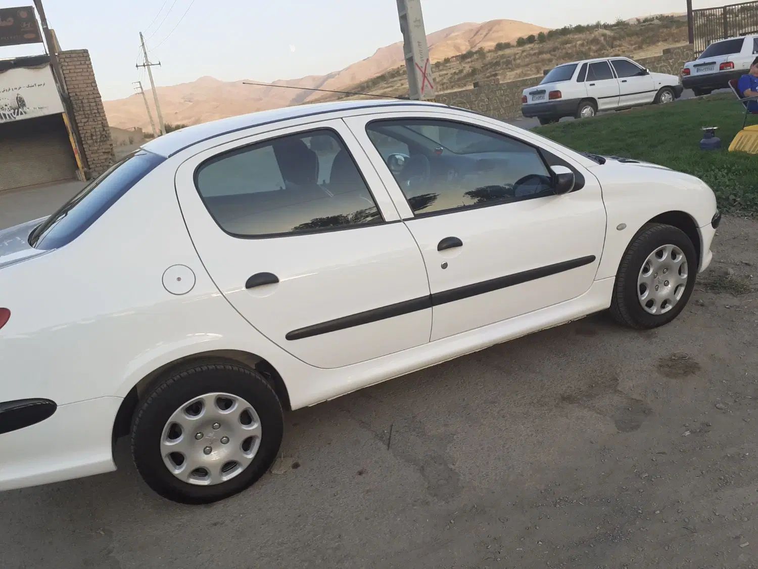 پژو ۲۰۶ صندوق دار v8 - 1397