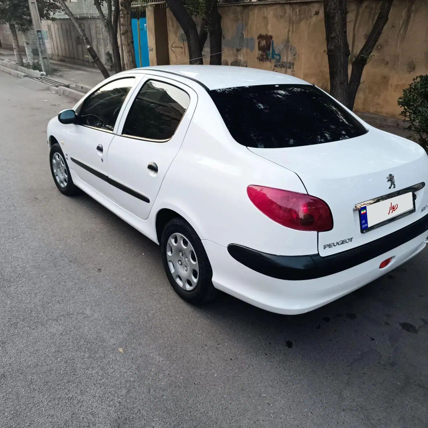 پژو ۲۰۶ صندوق دار v8 - 1396