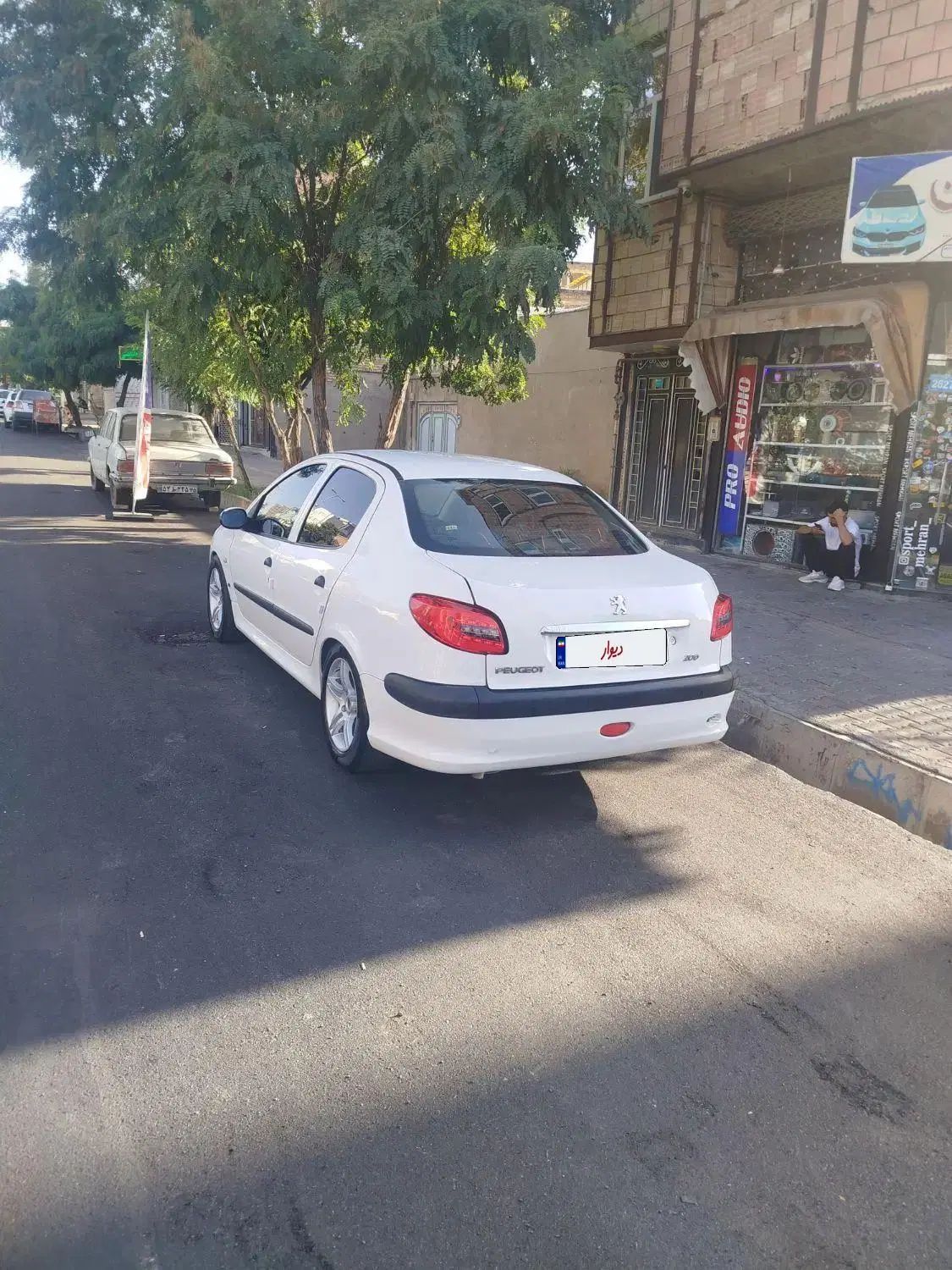 پژو ۲۰۶ صندوق دار v8 - 1395