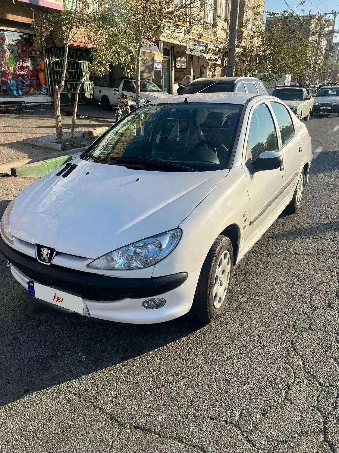 پژو ۲۰۶ صندوق دار v8 - 1397
