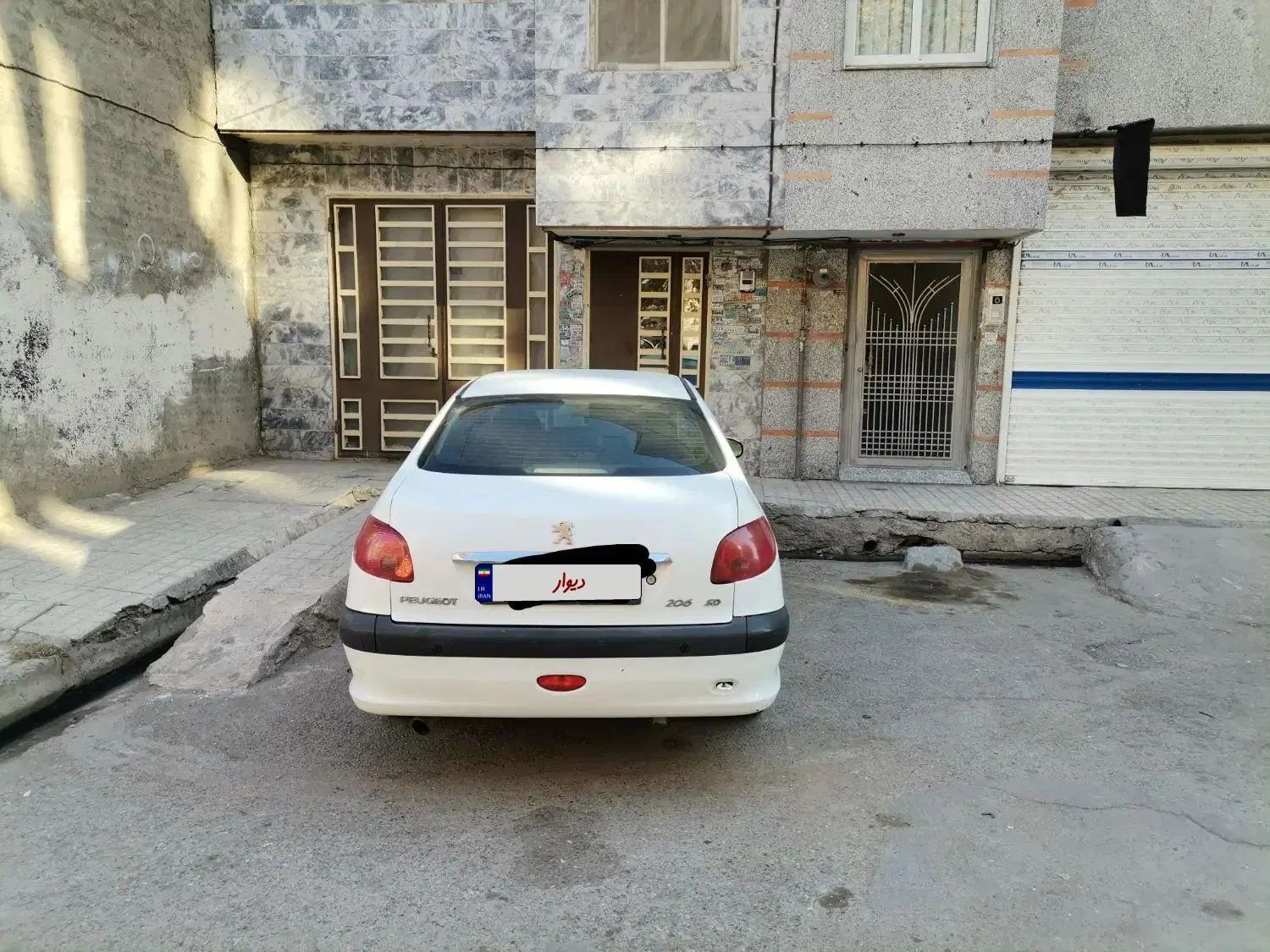 پژو ۲۰۶ صندوق دار v8 - 1394
