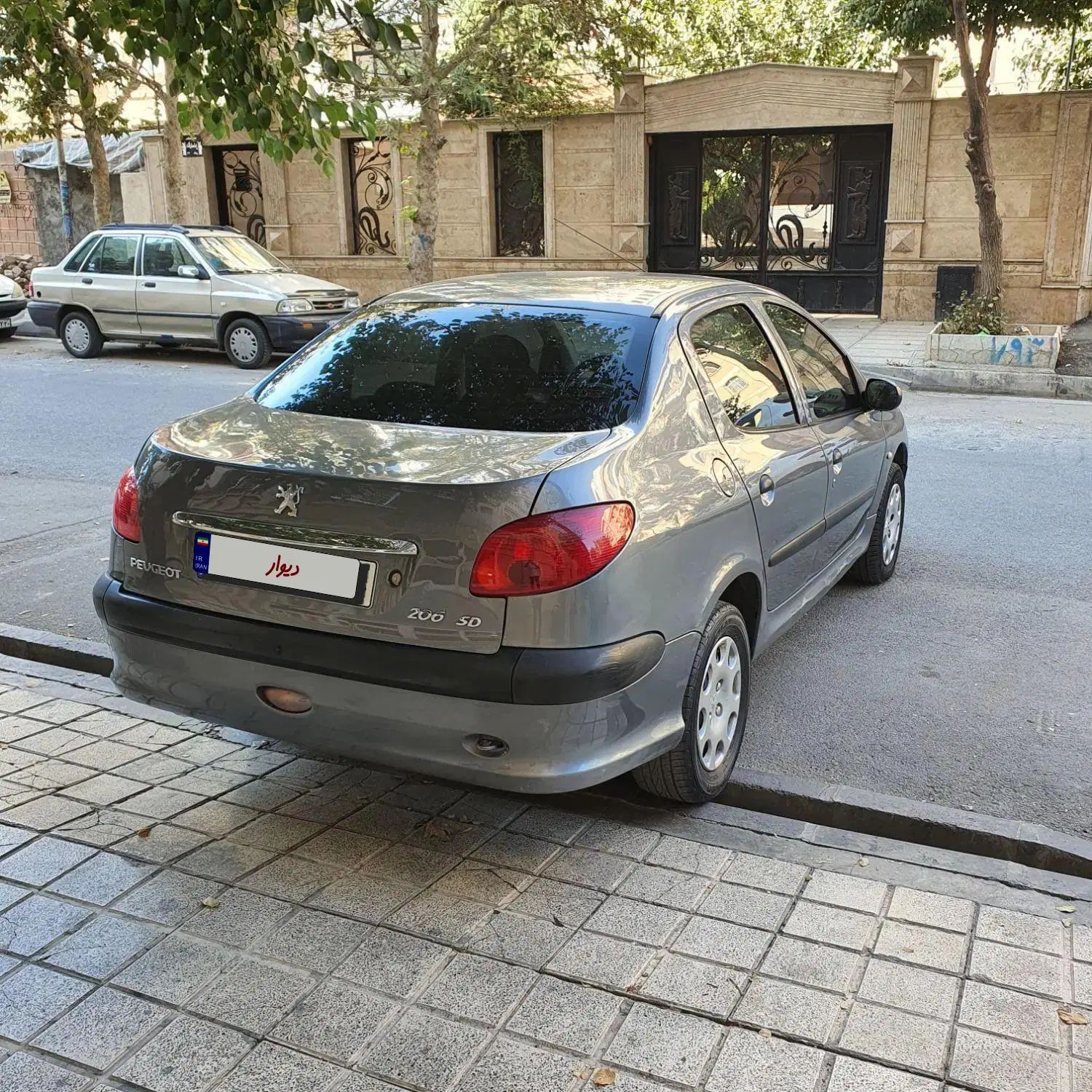 پژو ۲۰۶ صندوق دار v8 - 1391