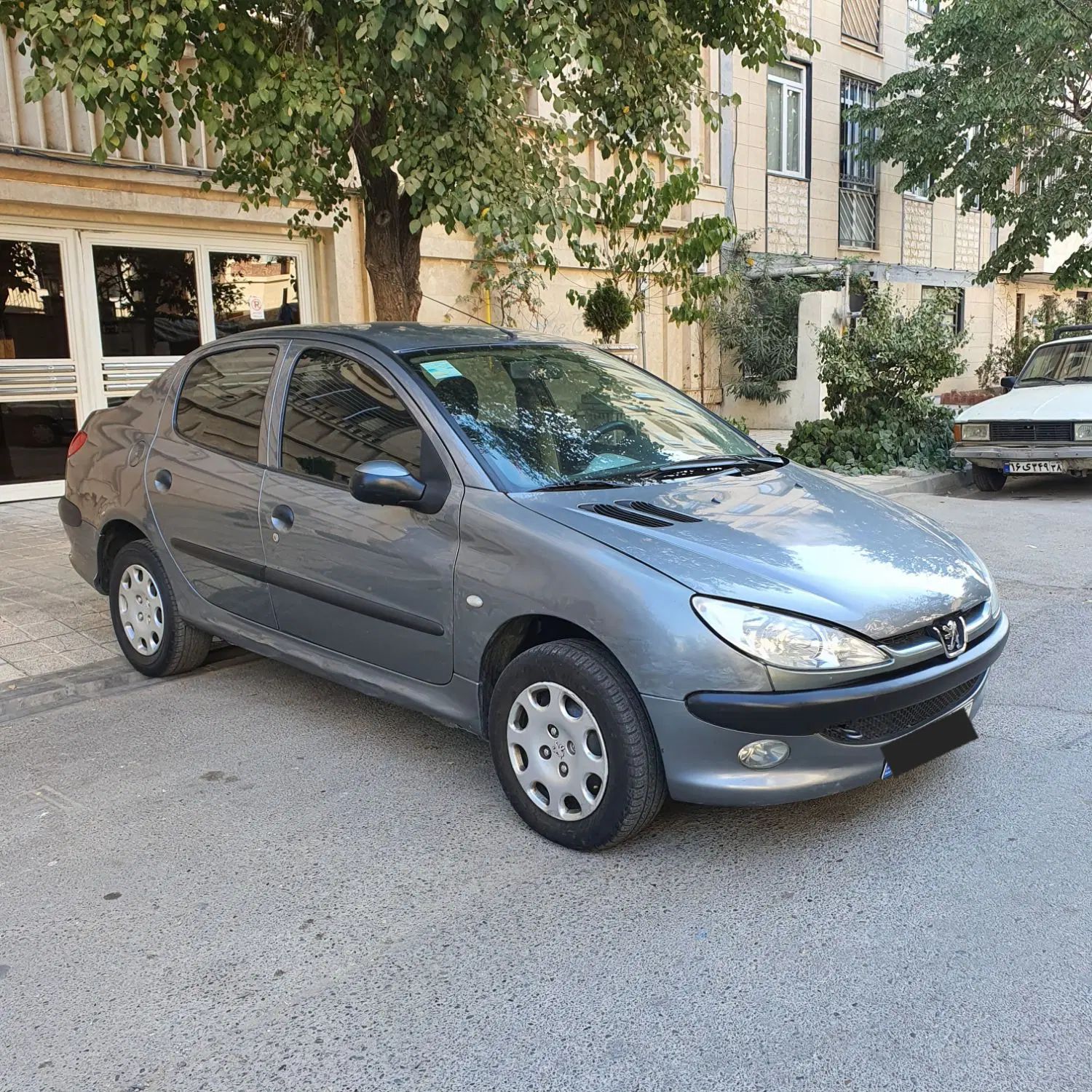 پژو ۲۰۶ صندوق دار v8 - 1391