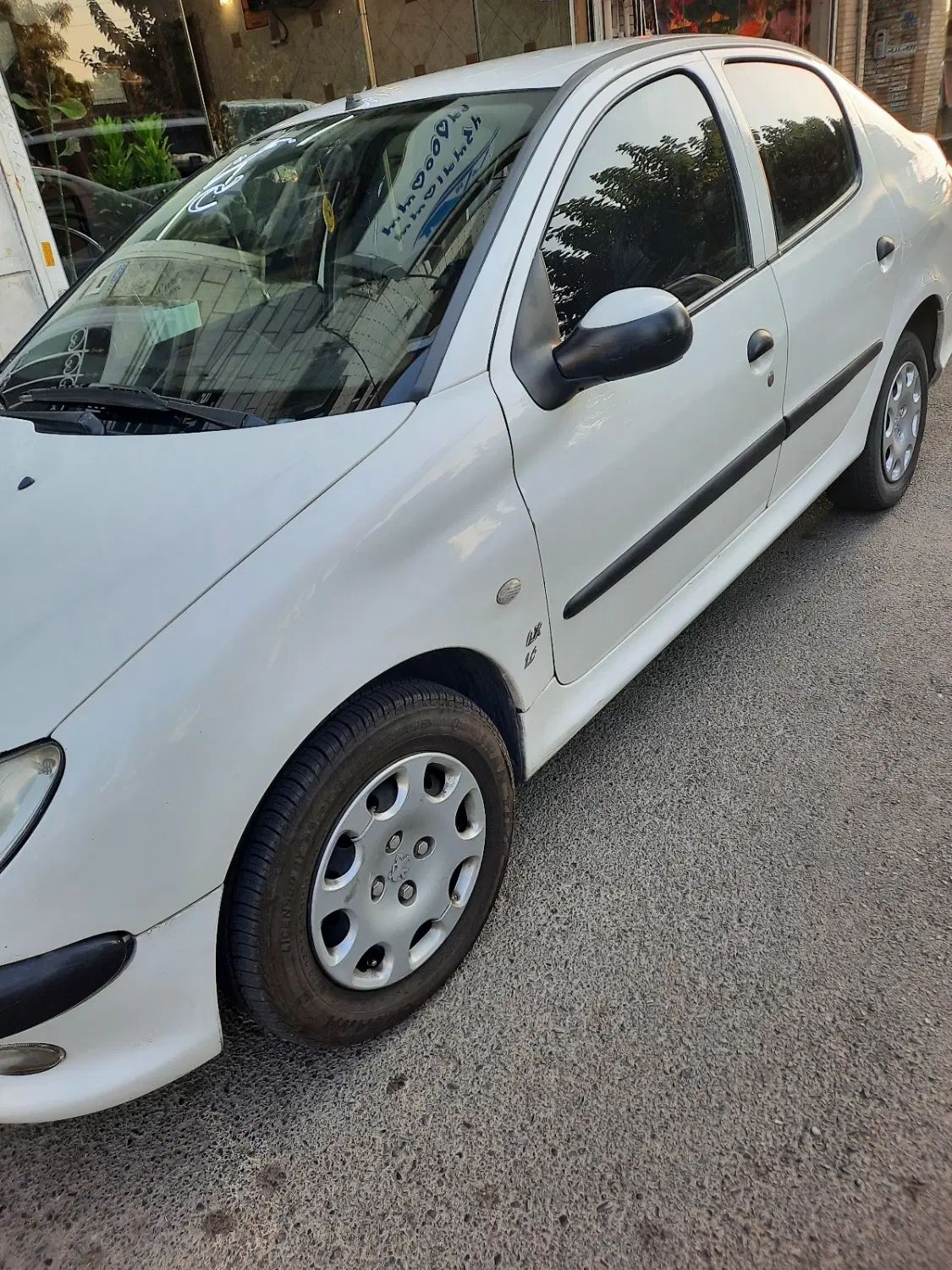 پژو ۲۰۶ صندوق دار v8 - 1396