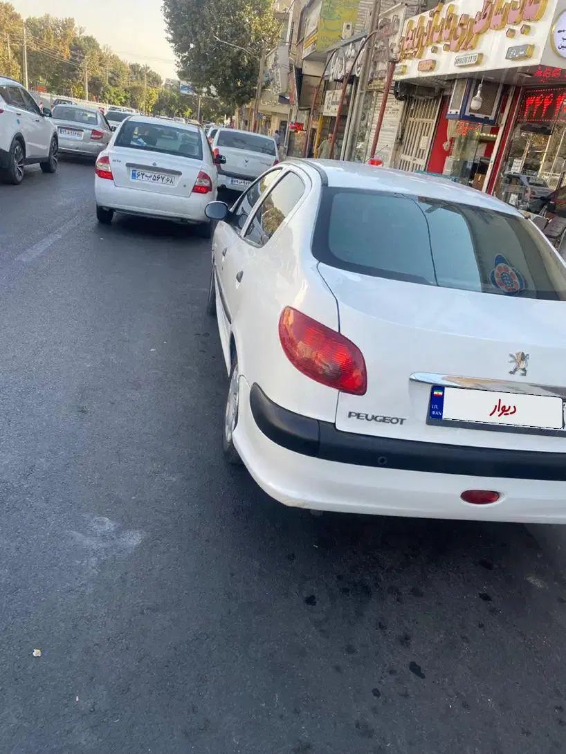 پژو ۲۰۶ صندوق دار v8 - 1396