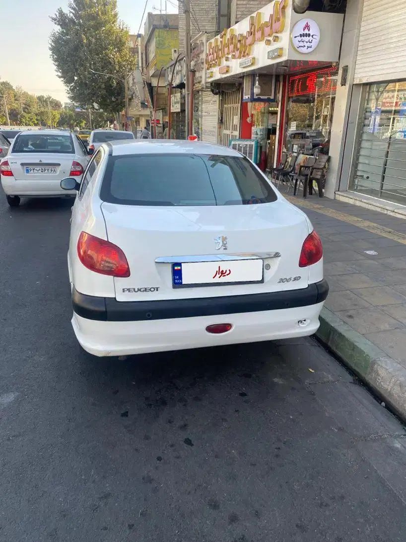 پژو ۲۰۶ صندوق دار v8 - 1396