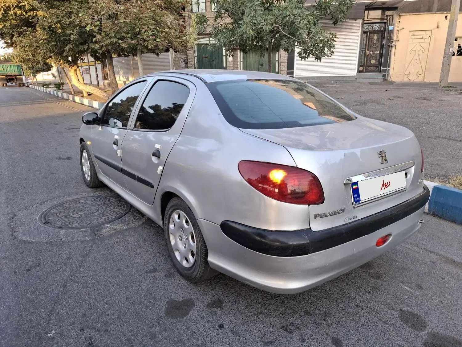 پژو ۲۰۶ صندوق دار v8 - 1385