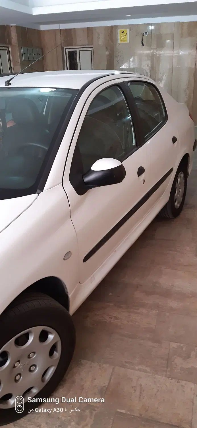 پژو ۲۰۶ صندوق دار v8 - 1390