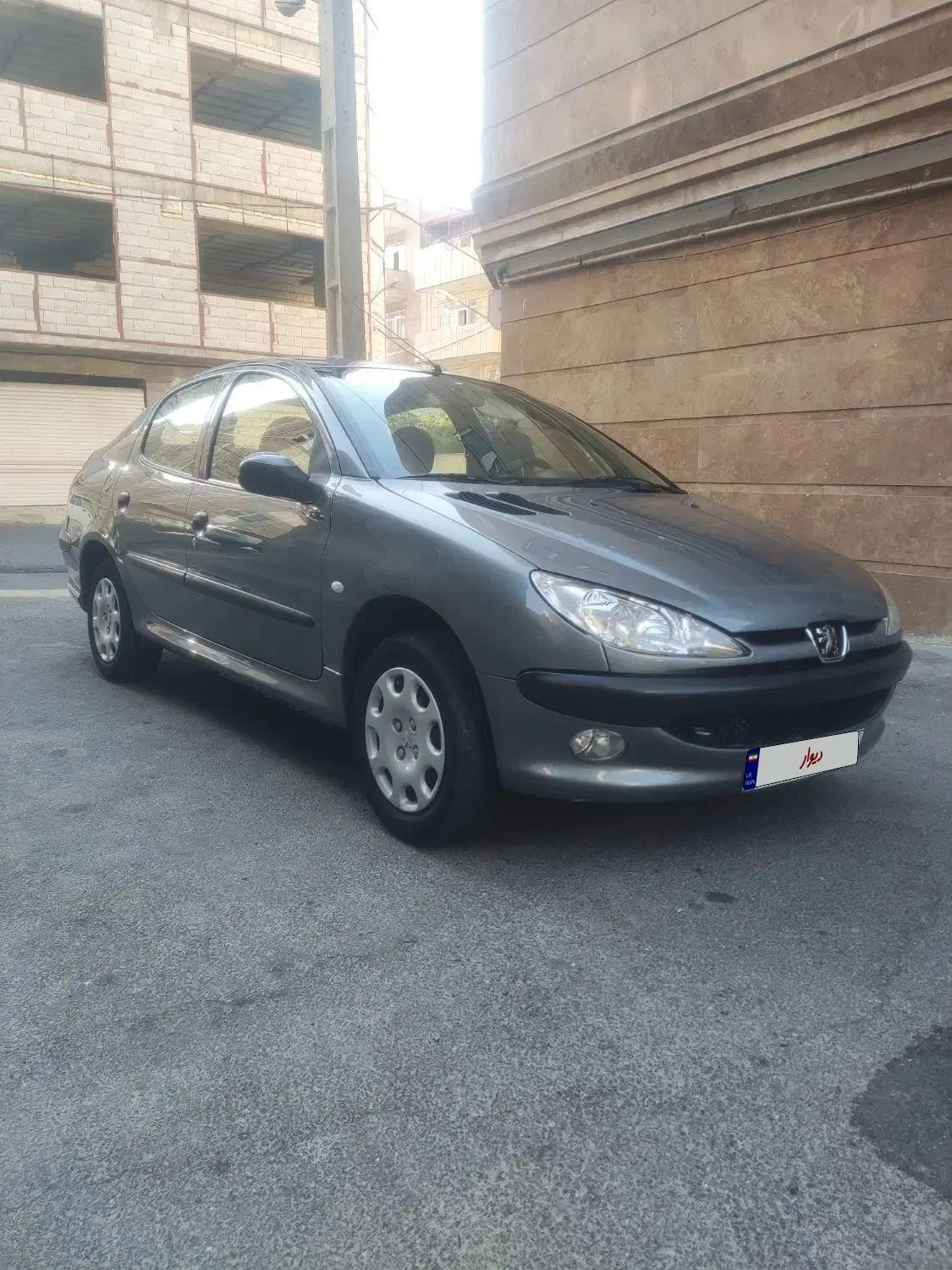 پژو ۲۰۶ صندوق دار v8 - 1396