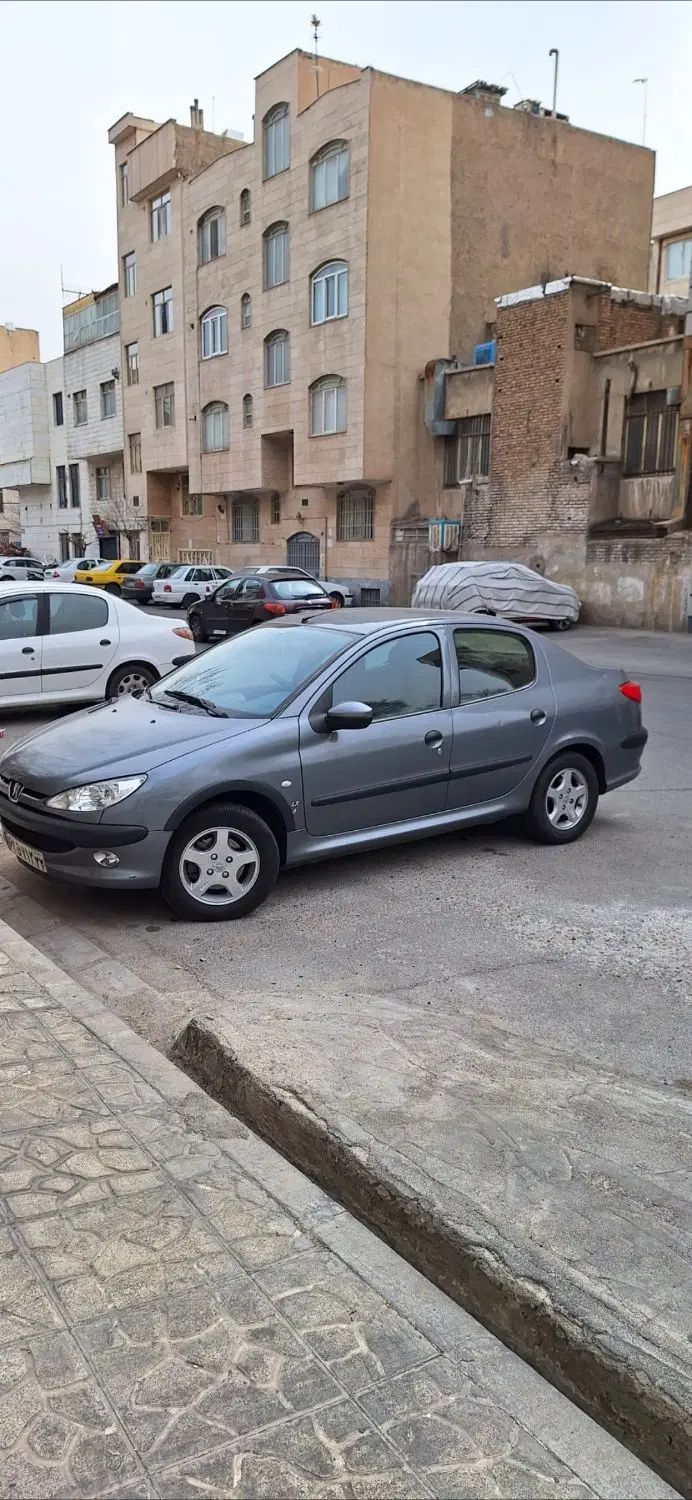 پژو ۲۰۶ صندوق دار v8 - 1396