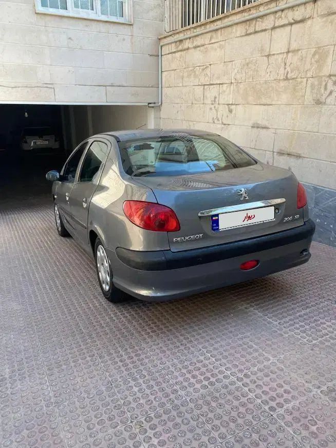 پژو ۲۰۶ صندوق دار v8 - 1394