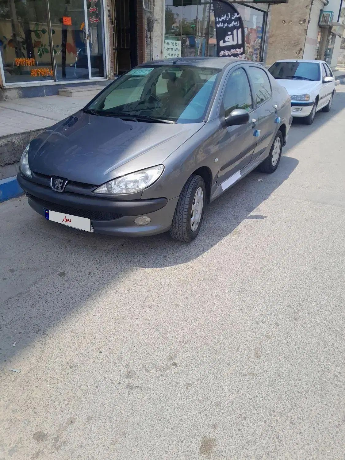 پژو ۲۰۶ صندوق دار v8 - 1395