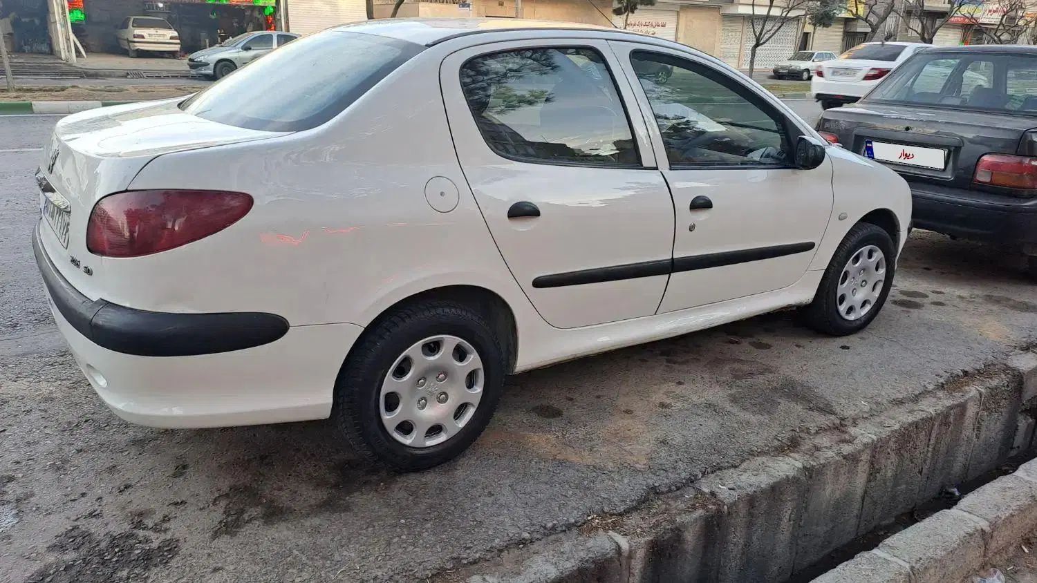 پژو ۲۰۶ صندوق دار v8 - 1392
