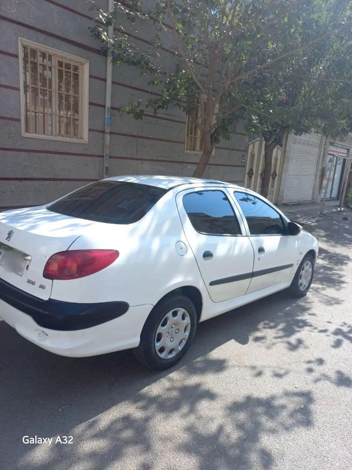 پژو ۲۰۶ صندوق دار v8 - 1399